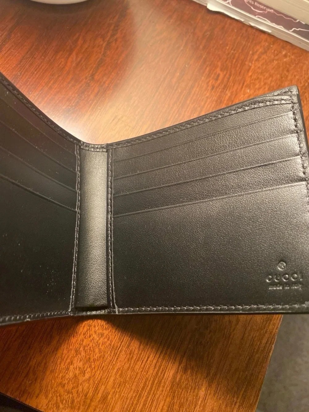 Gucci “Gold Label” Leather Bifold Wallet